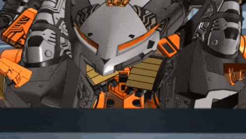 a close up of a robot with the letter c on it 's chest
