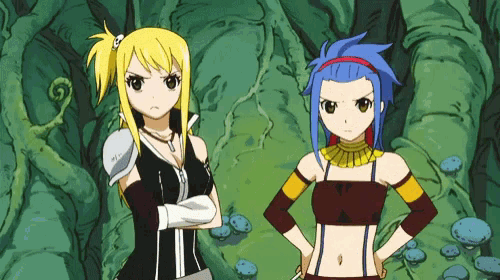 a couple of anime girls standing next to each other with their arms crossed
