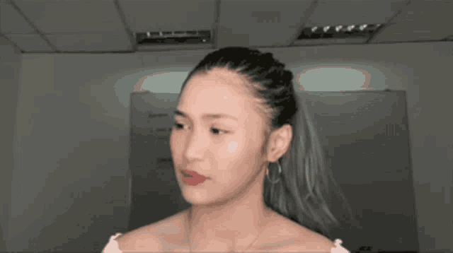 a woman with a question mark on her head