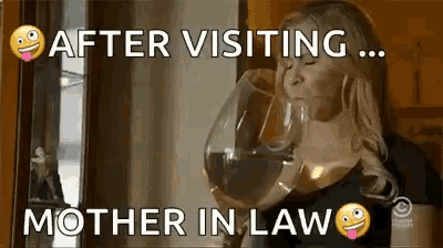 a woman is drinking a glass of wine and says after visiting mother in law