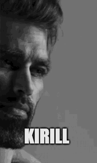 a black and white photo of a man with a beard and the word kirill written on his face .