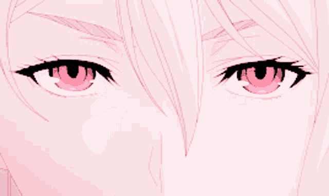 a close up of a person 's pink eyes