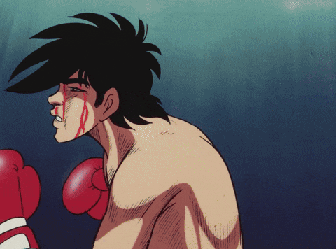 a boxer with blood coming out of his nose and mouth