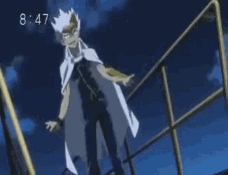 a man in a white cape stands on a railing with the time 8:47