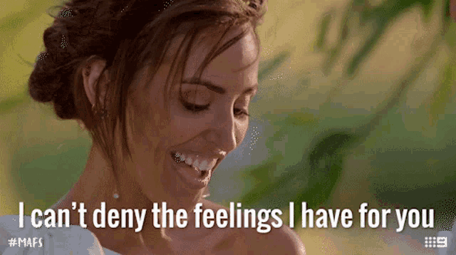 a woman is smiling with the words " i can 't deny the feelings i have for you " above her