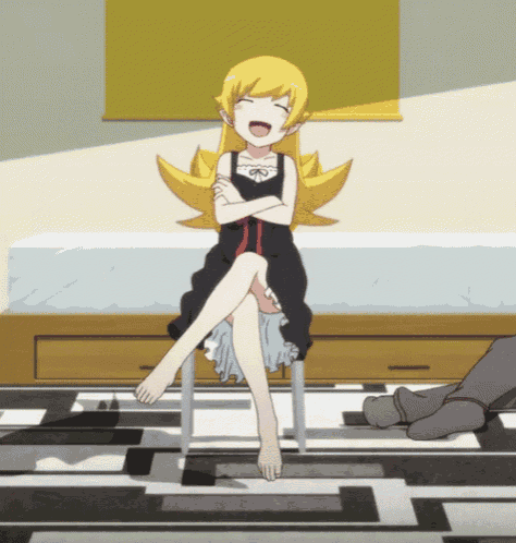 a girl with blonde hair is sitting on a chair with her arms crossed