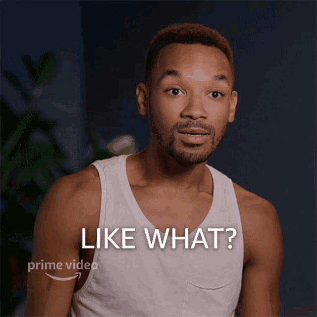 a man in a white tank top with the words like what on the bottom