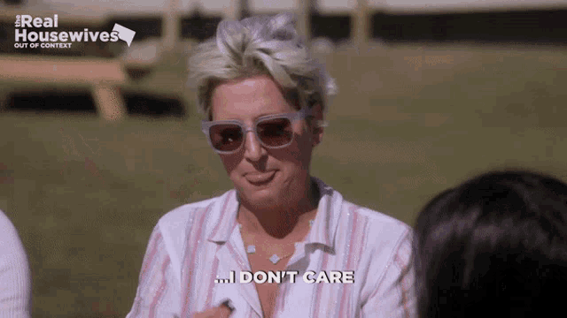 a woman wearing sunglasses says i don t care