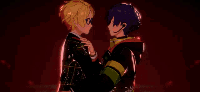 a couple of anime characters standing next to each other in front of a red background