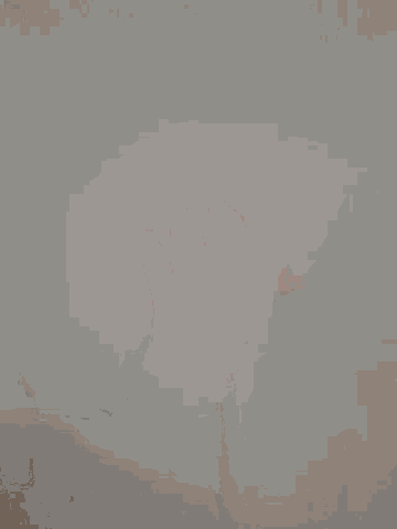 a person 's hand is reaching out towards a white surface