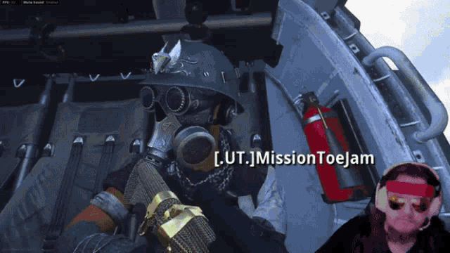 a man in a gas mask is playing a video game with the name mission toejam