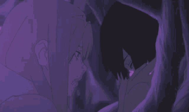 a man and a woman are standing next to each other