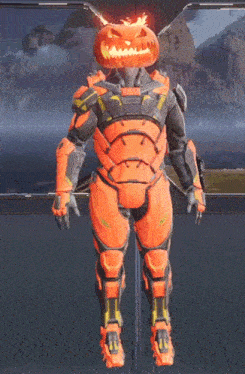 a man in orange armor with a pumpkin head on his head