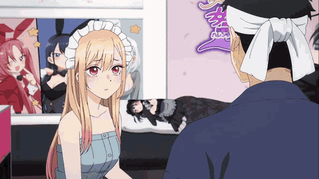 a man with a bandana on his head looks at a girl in front of a sign that says tokyo anime