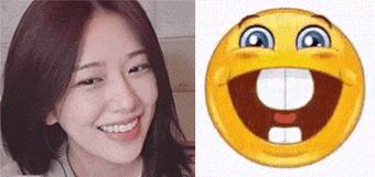 a woman is smiling next to a smiley face with a big smile on it .