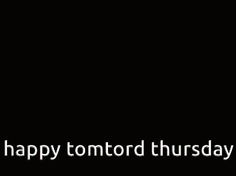 a happy tomtord thursday billboard with a cartoon character on it