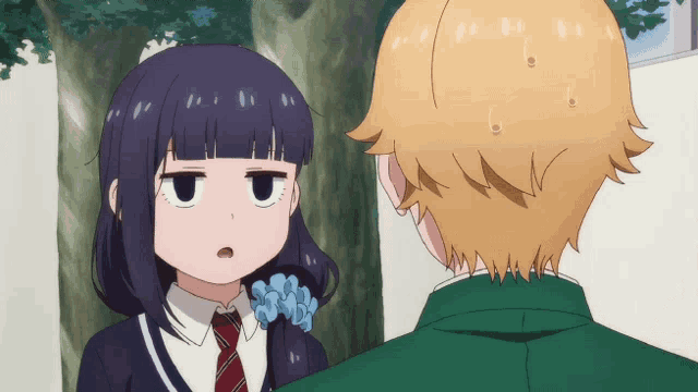 a man and a girl are looking at each other