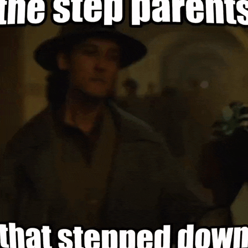 a blurry picture of a man with a caption that says the step parents that stepped down