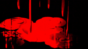a close up of a person 's face with their mouth open