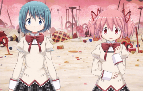 two anime girls are standing next to each other in a desert