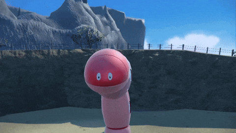 a pink worm with a red head and eyes