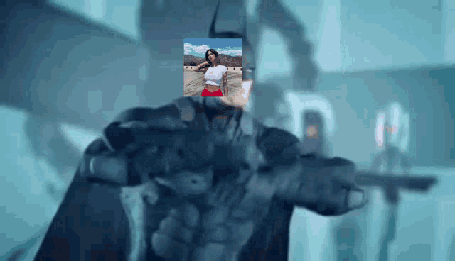 a batman with a picture of a woman behind his mask