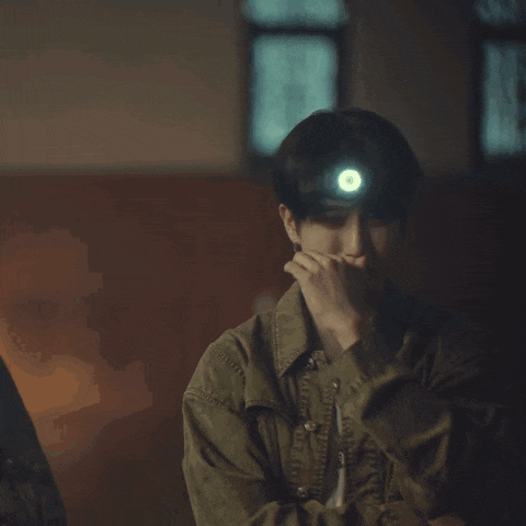 a man with a flashlight on his head