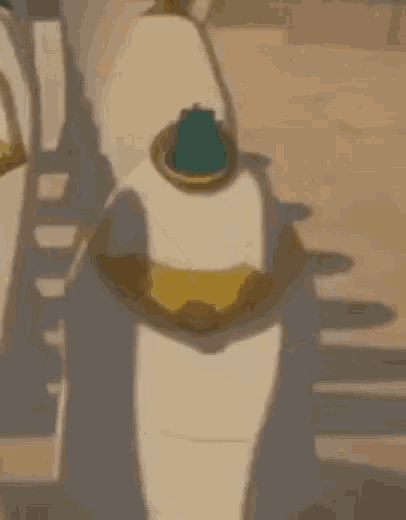 a cartoon character is standing in the desert with a shadow on his head .