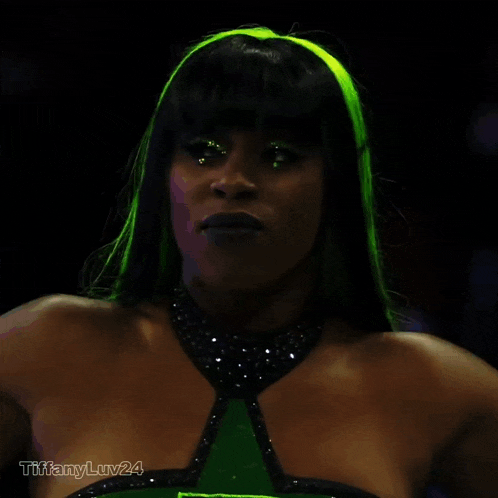 a picture of a woman with green hair and the name tiffany luv24 on the bottom