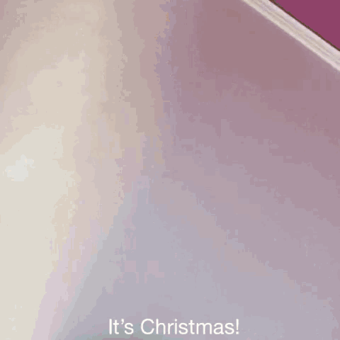 a picture of a christmas tree with the words it 's christmas below it