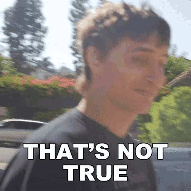 a blurry picture of a man with the words that 's not true written below him