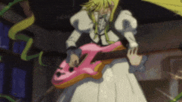 a girl in a white dress is playing a pink electric guitar