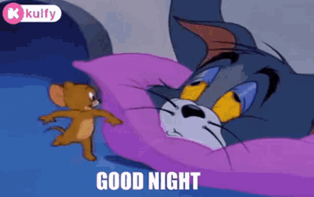 a cartoon of tom and jerry laying on a pillow .