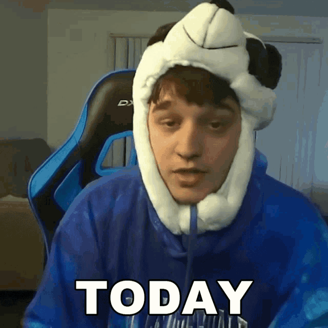 a man wearing a hat that says today
