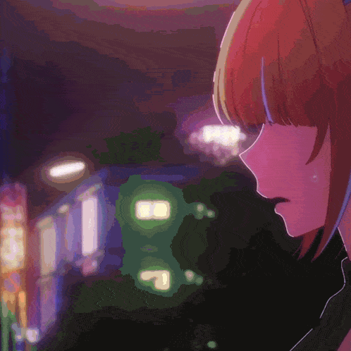 a close up of a girl 's face with a blurred background