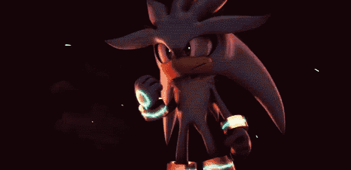 silver the hedgehog from the video game sonic the hedgehog is standing in the dark and looking at the camera .