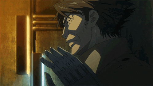 a man is holding a gun in his hand and talking on the phone