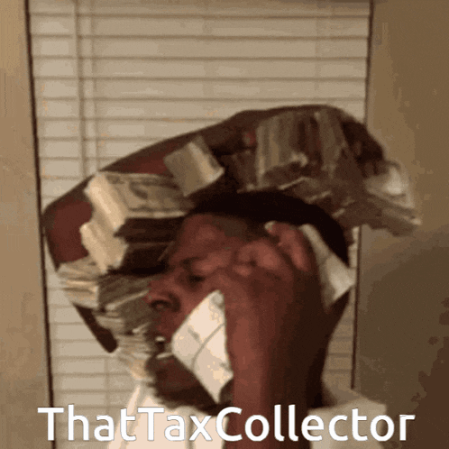 a man talking on a cell phone with a stack of money on his head that says that taxcollector on it
