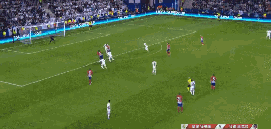 a soccer game is being played in a stadium with uefa super cup advertisements
