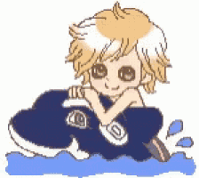 a boy is riding a jet ski in the ocean .