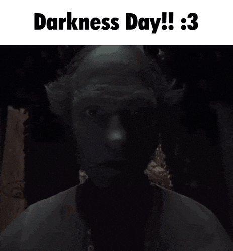 a picture of a man in the dark with the words darkness day !! : 3