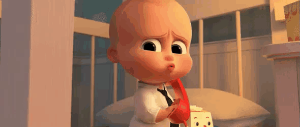 a cartoon baby is talking on a red telephone in a crib .