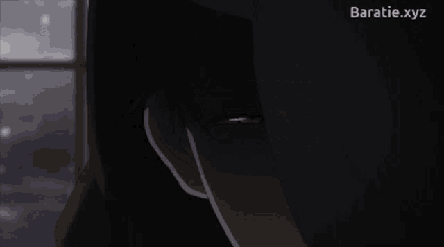a close up of a person 's face with the website baratie.xyz visible