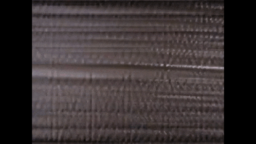a blurred image of a person 's face is being displayed on a screen