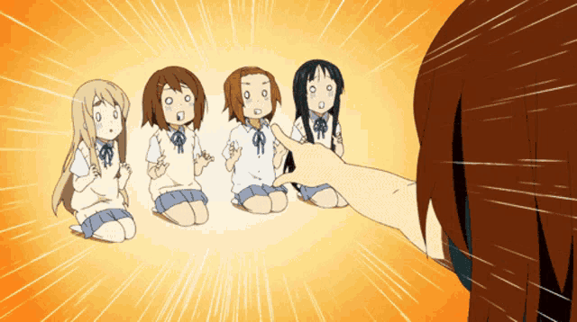 a group of anime girls are sitting on the floor and one of them is pointing