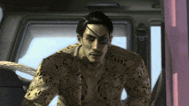 a man in a snakeskin shirt has a tattoo on his eye