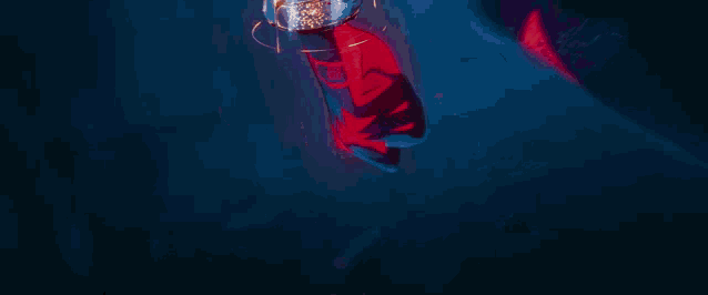 a close up of a person 's foot with a red heart on it