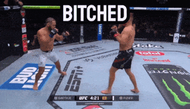 two men are fighting in a boxing ring and the words bitched are on the screen