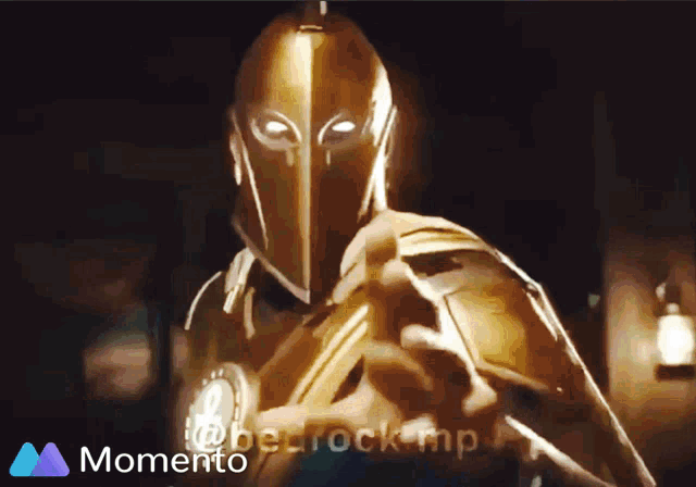 a picture of a man in a knight 's armor with a momento logo behind him
