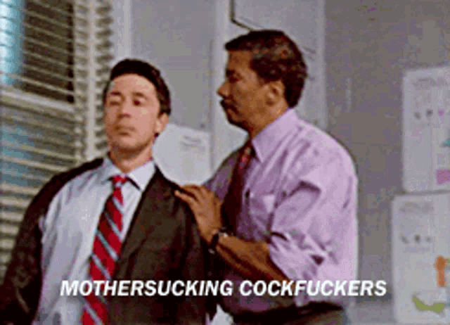 two men standing next to each other with the words mothersucking cockfuckers written on the bottom